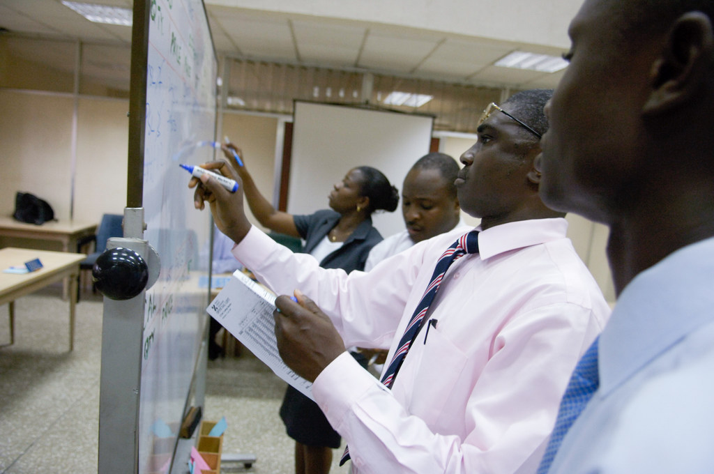 Traders work on the floor of the Ghana Stock Exchange in Accra, Ghana.