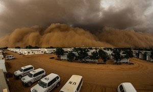 A sand storm, known locally as a haboob, builds up over a UN compound in northern Darfur in Sudan. 