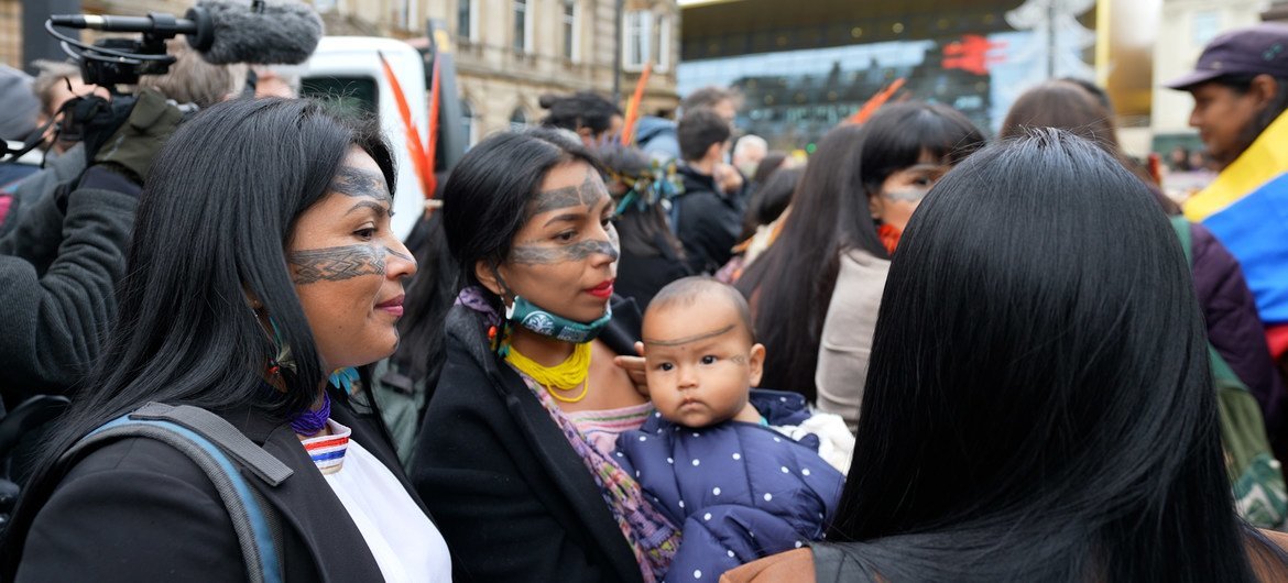 Indigenous activists show  connected  the streets of the COP26 big   city, Glasgow, during the landmark UN clime  conference.