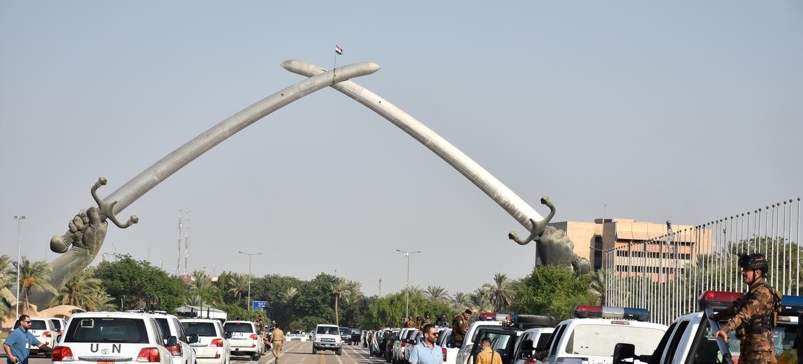 UN vehicles gathered at the Arc de Triomphe in Baghdad before transporting UN displays to polling stations on Election Day, 10 October 2021