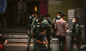 Police officers in Hong Kong meet on the streets of the city in October, 2020.