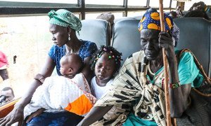 A displaced family leaves a UN protection camp in Juba to return to their home in the Jonglei region of South Sudan