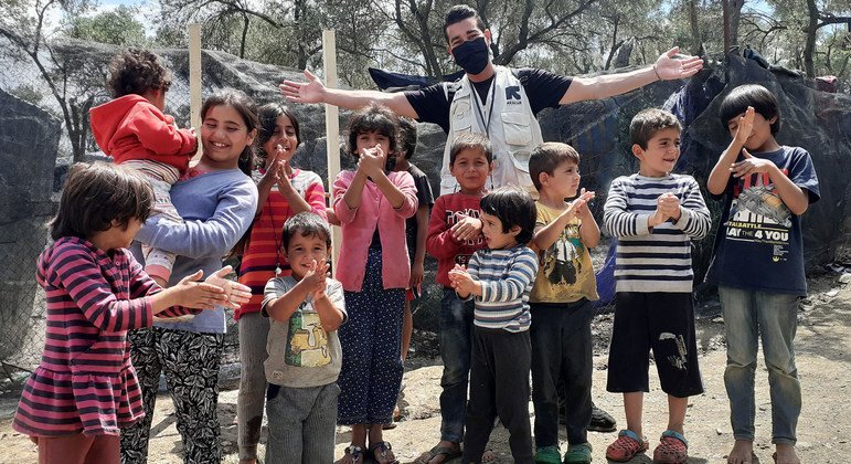 Shadi Mohammedali, a refugee from Gaza, now works for the International Rescue Committee (IRC). Here he is pictured in the Moria Refugee Camp in Greece.