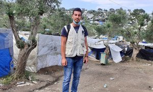 Shadi Mohammedali, a refugee from Gaza, now works for the International Rescue Committee (IRC). Here he is pictured in the Moria Refugee Camp in Greece.
