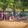 Foto de grupo com a comunidade de Calaveti na área de saúde do Centro de Saúde de Téngua, distrito de Milange, provincia de Zambezia  