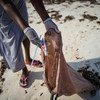 Litter is removed from a beach in Watamu in Kenya.