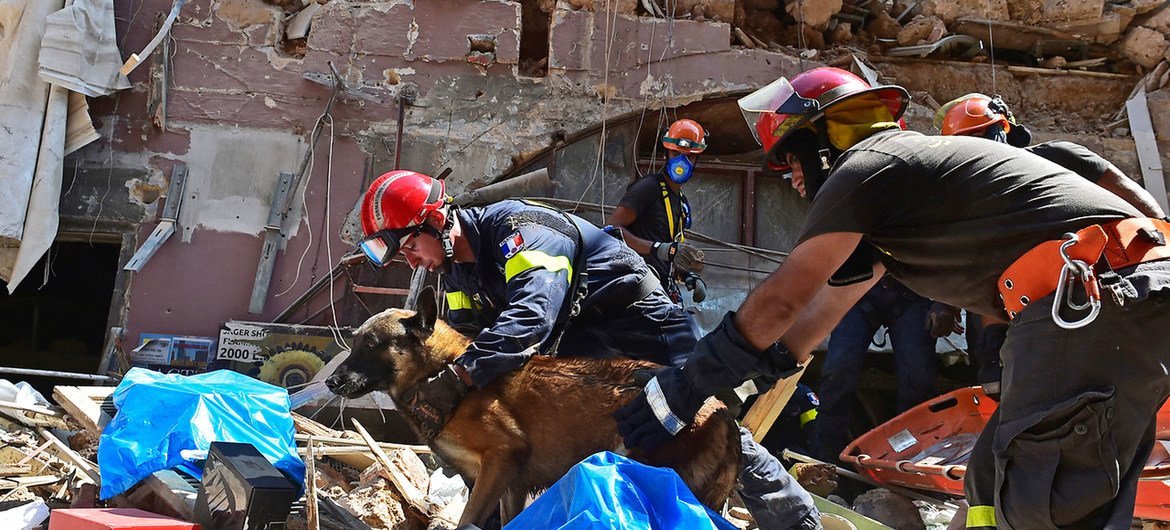 Search and rescue team combs rubble in Beirut after a blast on 4 August 2020.