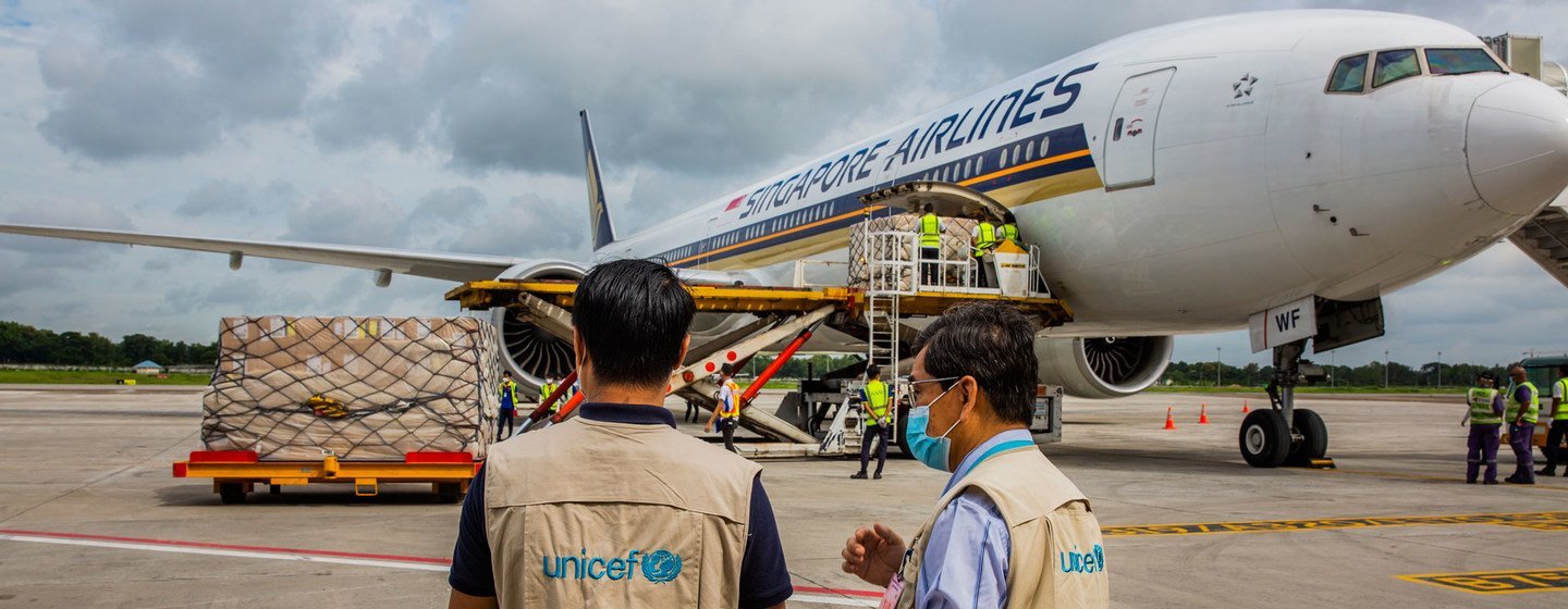 UNICEF Myanmar staff check cargo of PPE supplied by UNICEF at Yangon International airport, Myanmar.