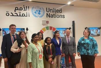 Maher Nasser, Commissioner-General of the UN at Expo 2020, with Dr. Dena Assaf, Deputy Commissioner-General with young climate activists participating at Expo climate action week at the UN Hub at Expo2020.