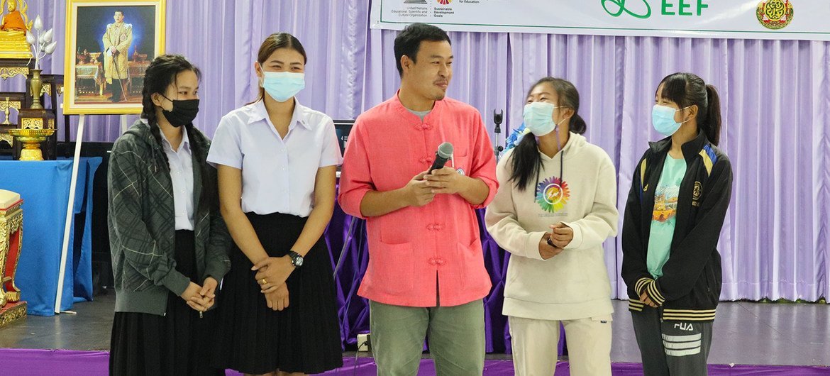 Chaisri Taya is teaching children from disadvantaged communities in the village of Ban Nai Soi, northern Thailand, using tools from UNESCO’s Learning Coin initiative