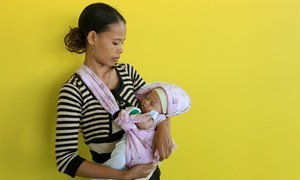 A mother and her newborn in Suai, Timor-Leste.