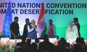 UN Deputy Secretary-General Amina Mohammed takes the stage with Indian Prime Minister, Modi, during a high-level segment on Climate Change at the gathering at the Conference of Parties (COP14) to UN Convention to Combat Desertification (UNCCD).