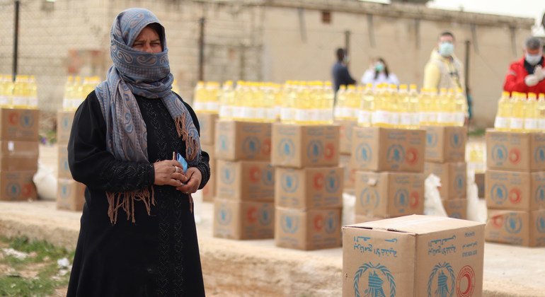 Des gens dans la ville de Deir Hafer en Syrie dépendent du PAM pour subvenir à leurs besoins.