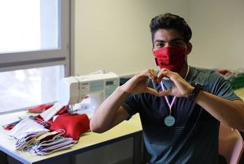 A 23-year-old Afghan refugee has stitched over 700 protective masks during the COVID-19 crisis to help support his new community in France.