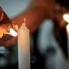 The Jewish ritual of lighting candles at dusk, Hadlakat Nerot, is being executing at the beginning of Shabbat in Rio de Janeiro, Brazil.