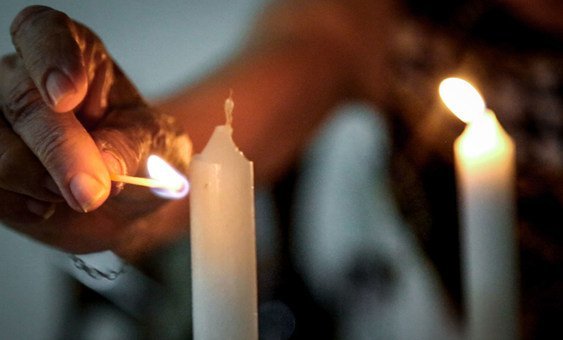 Freddy Glatt performs the Hadlakat Nerot, the Jewish ritual of lighting candles at dusk.