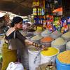 A woman shops for pulses at a market in downtown Karachi, Pakistan.