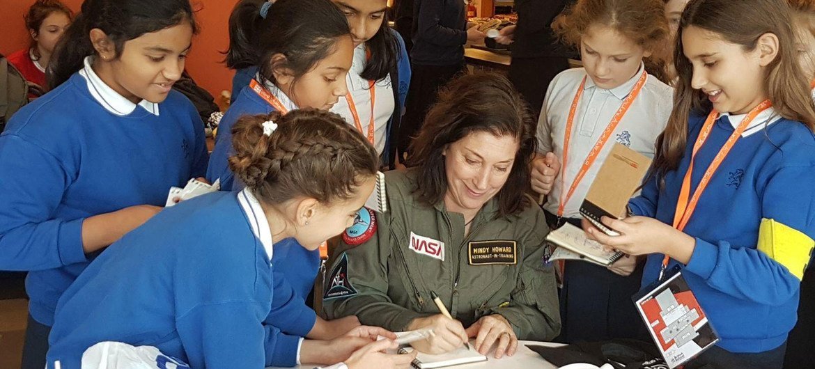 Mindy Howard signs autographs for girls after giving a TEDx talk at the British School in the Netherlands.