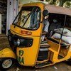 Distribution de nourriture du PAM à l'aide de rickshaws Kéké à Kano, Nigéria dans les quartiers touchés par le coronavirus