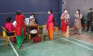 Healthworkers and frontliners in Gorkha District in north-central Nepal receive their second dose of the COVID-19 vaccine.