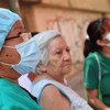Doctoras y enfermeras van de casa en casa para informar de la pandemia en Venezuela.