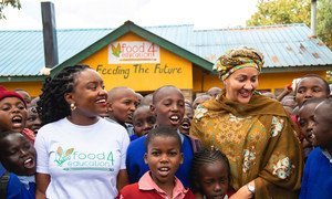 UN Deputy Secretary-General, Amina Mohammed (right) meets local school children at the Food4Education innovative partnership in Nairobi, Kenya.