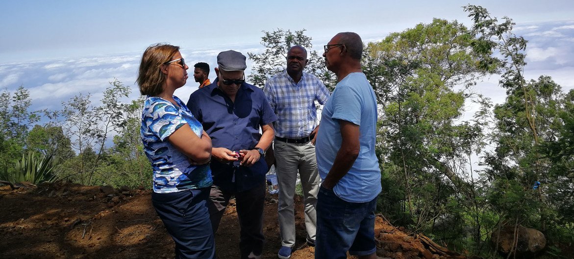 UN Resident Coordinator in Cape Verde, Ana Patricia Graça (left) discusses a reforestation project with local participants.