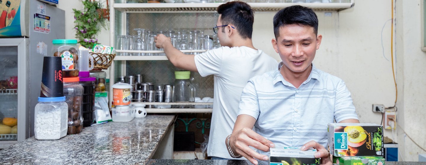 Nguyen Trong Hung (right) opened a café for the LGBT community in Son La, Viet Nam.