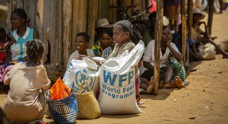 Residents in the drought affected communities of Ifotaka, southern Madagascar, collect  food assistance provided by the UN World Food Progamme.