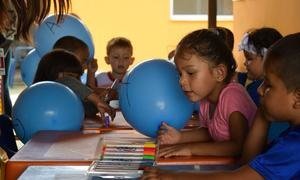 Children drawing in their classroom in the department of Arauca, Colombia.