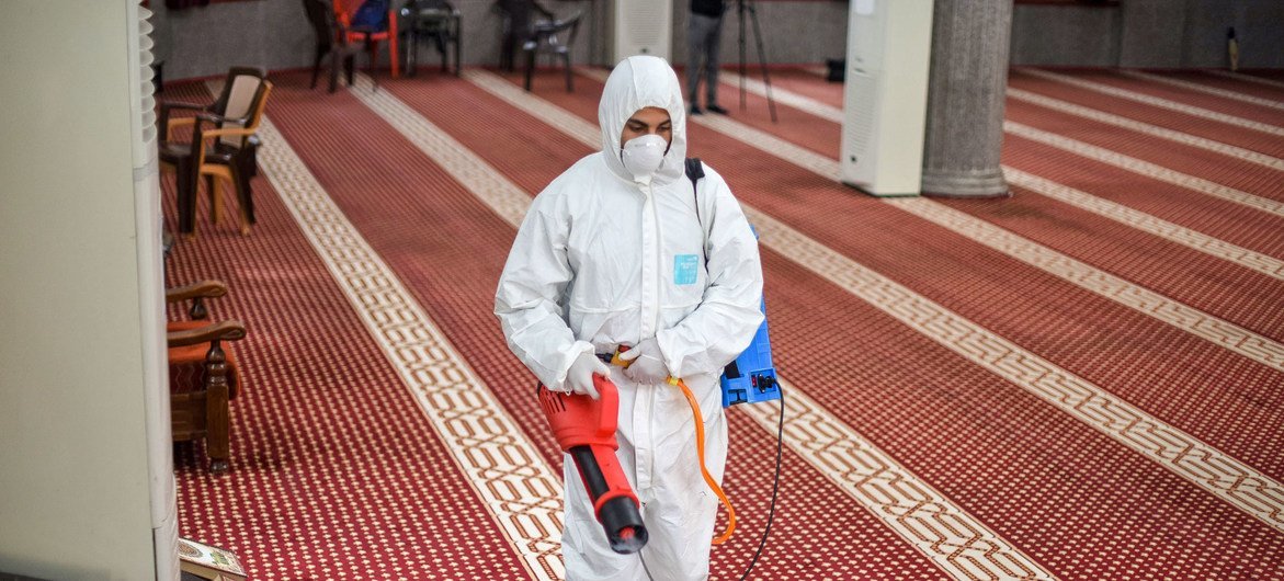 A mosque  in Gaza is cleaned to prevent the spread of COVID-19.