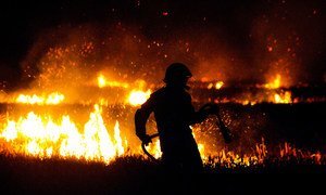 A firefighter battles a wildfire. (file)
