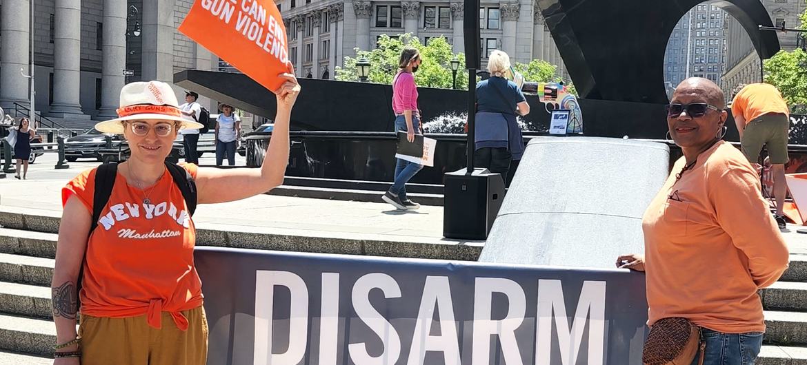 Activists hold placards at a protest against gun violence in New York.