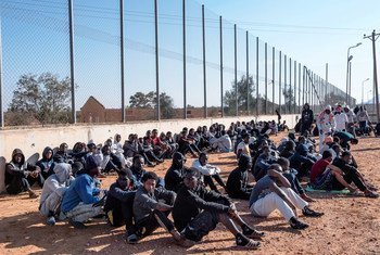 Migrants sit in the courtyard of a detention centre in Libya. (file)
