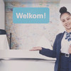 На этом плакате в Амстердаме написано "Добро пожаловать!". однако не все иммигранты и даже рожденные в стране дети оказываются желанными.