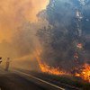 Firefighters in Queensland, Australia, tackle a blaze which is threatening local communities.