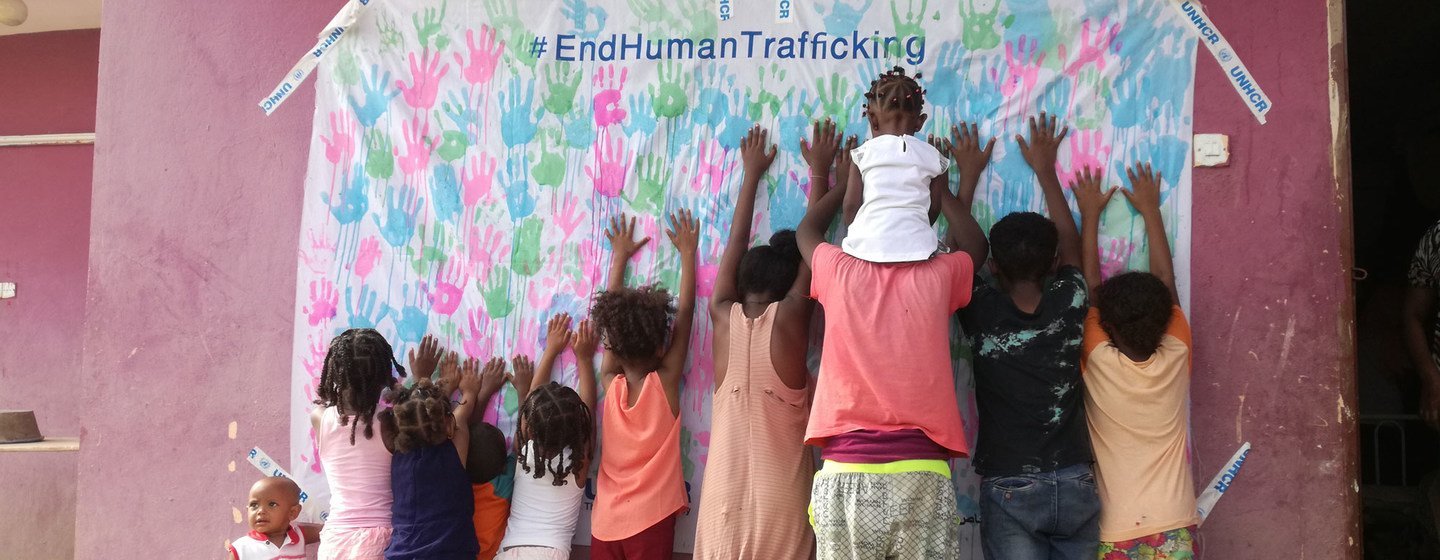 Refugee children show their support for a UN refugee agency anti-trafficking campaign at Wad Sharife camp in east Sudan.