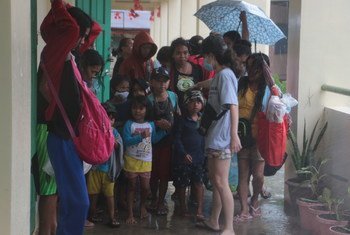 Children and families taking shelter at a school in Legazpi City, Albay province, Philippines, as Typhoon Vamco (known locally as Ulysses) made landfall. The province was hit hard by Typhoon Goni (known locally as Rolly) a week prior.