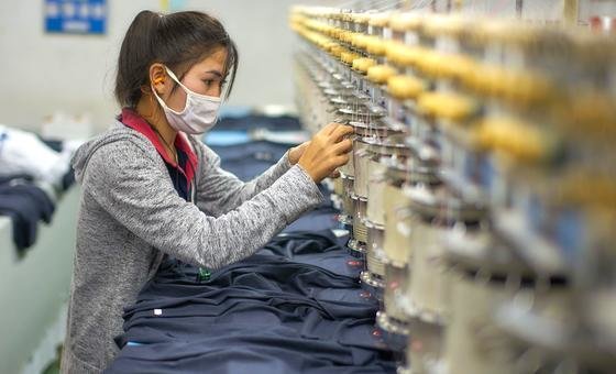 A female garment factory worker in Lao PDR.