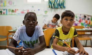 Two refugee boys in a classroom at a reception centre in Kos, Greece.