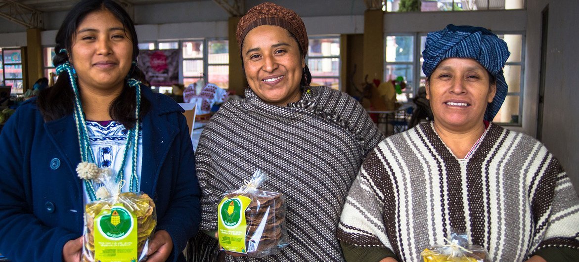 Raquel Diego Díaz (centre) is an anthropologist and farmer who promotes native varieties of corn and indigenous farming knowledge.