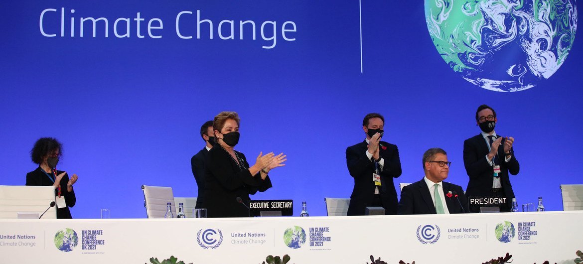 Patricia Espinosa, Executive Secretary of the UN Framework Convention on Climate Change (standing near left), and Alok Sharma President for COP26 (seated centre), at the closing of the UN Climate Conference in Glasgow, Scotland.