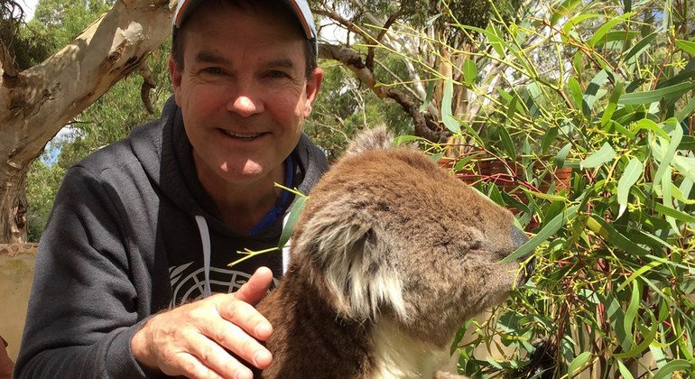John Scanlon and a koala, in South Australia.