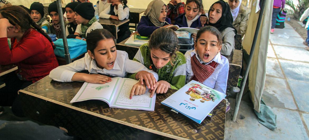 Displaced children successful  a schoolroom  successful  Baghdad, Iraq.