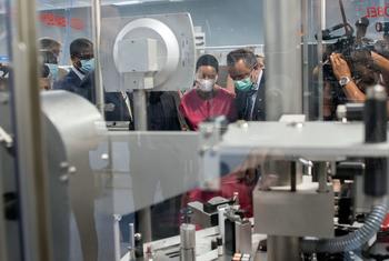 WHO Director Tedros  Ghebreyesus (right) and Belgian Development Minister Meryame Kitir visit Biovac, a WHO Vaccine Hub in Cape Town, South Africa.