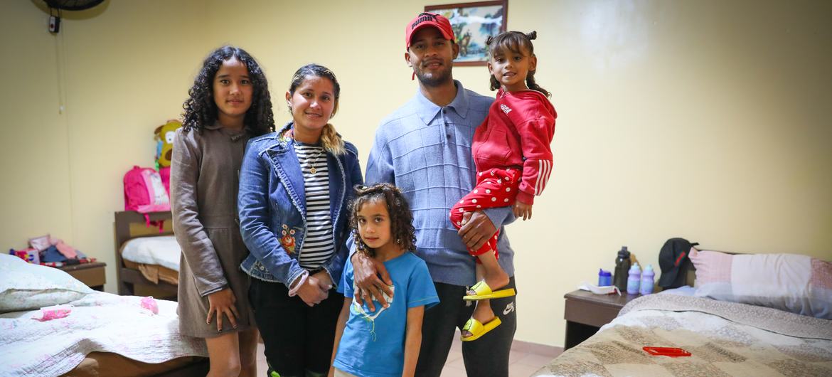 Francisco, a Venezuelan immigrant, and his family, at an IOM shelter.