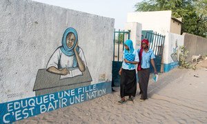 Young women return home after classes in the town of Bol in Chad.