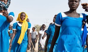Young women leave school in the town of Bol in Chad after classes.