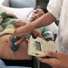 A pregnant woman has prenatal care performed at a hospital in Preah Vihear, Cambodia.