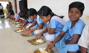 Children in India eating micronutrient enriched food as part of a WFP programme (file)